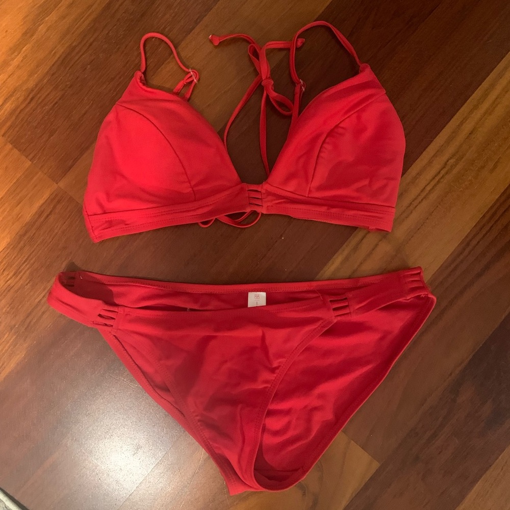 bright red bikini - low waisted - no wear - little cut outs - size large (11-13)
